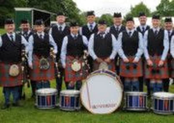 Home win for Bleary:  Bleary and District Pipe Band pictured at the Craigavon & District Pipe Band and Drum Major Championships in Lurgan Park on Saturday 15th June.  Included are Pipe Major Nigel Davison (left) and Leading Drummer David Brown (right).  The band were placed 1st overall in Grade 2 along with best drum corp and bass section.
