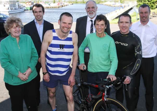 Pictured at Ballyronan for the launch of the new format Lough Neagh Triathlon on Sat 17th August were front row from left May Devlin Ballyronan Development Association,  Eunan Murray Sports Services Officer Cookstown District Council, Brian Campbell competitor, Liam Glavin Leisure Services Manager Cookstown District Council, Anne Paul and John Joe Muldoon competitors and Ian Lyle Race Director.