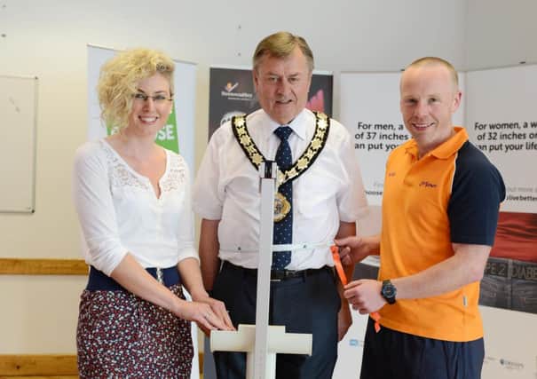 Pictured (l-r) at Sixmile Leisure Centre, Ballyclare are Hannah Dearie, Public Health Agency; Mayor of Newtownabbey, Alderman Fraser Agnew and Alan Hamilton, Newtowabbey Borough Council. INNT 25-525CON Pic by David Scott