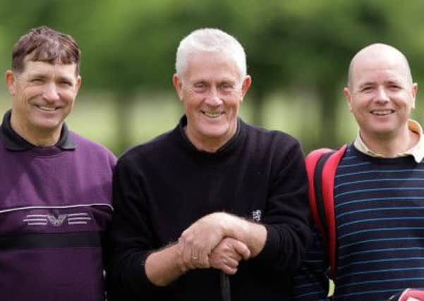 Ray Rodgers, Robert McCullough and Andrew Burrell playing their round at Lambeg Golf Club. US1325-515cd