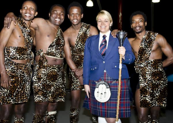 Paula Braiden (World Champion Drum Major) and the Afrikan warriors, who will take part in the Walled City Tattoo