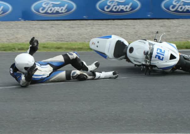Dean McMaster slid off his Triumph at Mondello. He was unhurt. Picture: Roy Adams.