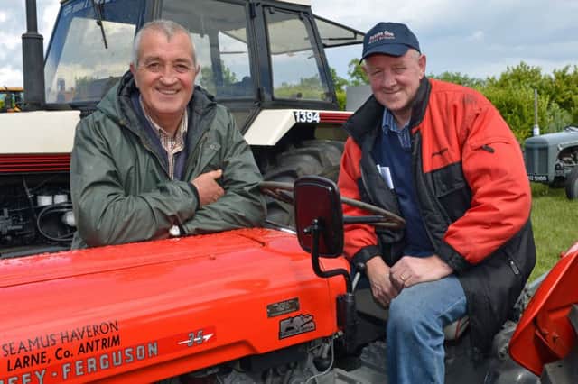 Seamus Haveron is pictured on his Massey Ferguson 35 along with Sean McCafferty at the vintage day at the Glynn to raise funds for the East Antrim Riding for the Disabled. INLT 27-021-PSB