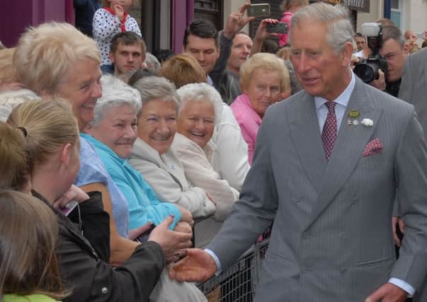 Prince Charles meeting the crowds in Larne. INLT 26-513-PR