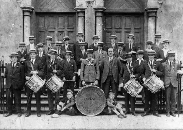 A real blast from the past - The Ballymena Excelsior Flute Band: (back row from left) A. Carleton, R. Reid, B. Hamill, A. Ross, A. Pedlow, J. McClintock, J. Wilson and H. O'Neill; (middle row) J. Reid, J. Scullion, W. Kilpattrick, A. Grant, A. Eagleson, T. Eagleson, T. Murray, and R. Ballentine; (front row), R. Eagleson, J. O'Neill, J. Kennedy, D. McClintock, J. Barr, J.H. Montgomery, H. Bell, J. Houston, S. Wilson, W. Montgomery; (boys) J. Leitch and A. Thompson.