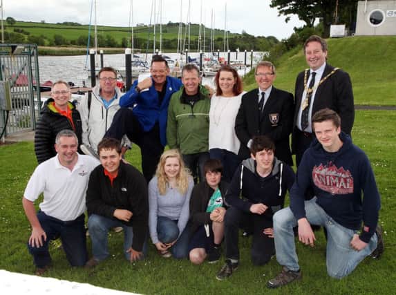 Competitors at the start of the 24 hour yacht race at Coleraine Yacht Club on Saturday with Alan Simpson, Radio Ulster, Ivan Campbell, Club Commodore, and Councillor David Harding, Mayor of Coleraine. INCR26-410PL