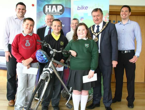 Back row (l-r) Tom Durrant, Home Accident Prevention Officer, NBC, Michael Lindsay, Sustainable Travel Co-ordinator, Travelwise NI, David McCoy, Carnmoney Raleigh Centre, Mayor Fraser Agnew, James OKane, Environmental Health Officer. Front row (l-r) Gareth Blair, Rathcoole PS, Josh Pyper, Doagh PS and Sarah Martin, Ashgrove PS. INNT 27-510CON