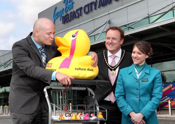 AND THEY CALL IT DUCKY LOVE  Neil Devlin, General Manager of the Everglades Hotel in Derry~Londonderry was delighted to be reunited with the hotels much-loved Everglades Culture Duck after pranksters had waddled off with it following a recent visit to the 4* hotel.  After reading about the ducks disappearance, eagle eyed Deputy Mayor of Craigavon, Councillor Colin McCusker, spotted the duck boarding an Aer Lingus flight to London at Belfast City Airport and informed the Everglades Hotel staff straight away.  The lucky duck was eventually tracked down and flown back on the same Aer Lingus service from Gatwick.  Pictured welcoming the Everglades Culture Duck back to Belfast are (from left) General Manager of the 4* Everglades Hotel, Neil Devlin; Councillor Colin McCusker, Deputy Mayor of Craigavon and Nicole Ferguson from Aer Lingus.