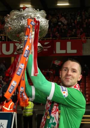 Larne man Marc Smyth played a crucial role in Cliftonville's success last season.