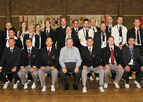 NI International Open Poomsae Championships held at Lisburn Rackets Club last weekend. The judges and organisers with Cllr Alderman Porter.