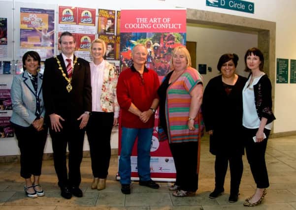 Pictured are Sinead Devine, secretary of First Act Youth Theatre; Martin Reilly, Mayor; Mary Duddy, founder and co-ordinator for First Act Youth Theatre; David Oddie, founder of INDRA; Catherine Cooke, chairpwoman; Marina Barham,  Al Harah Theatre, Beit Jala Palestine; Helena Hasson Festivals Officer Derry City Council.