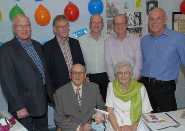 Lillian and William Sturdy at William's 100th birthday party with sons Orr, William, Kevin, Ian and Peter. INLT 27-391-PR
