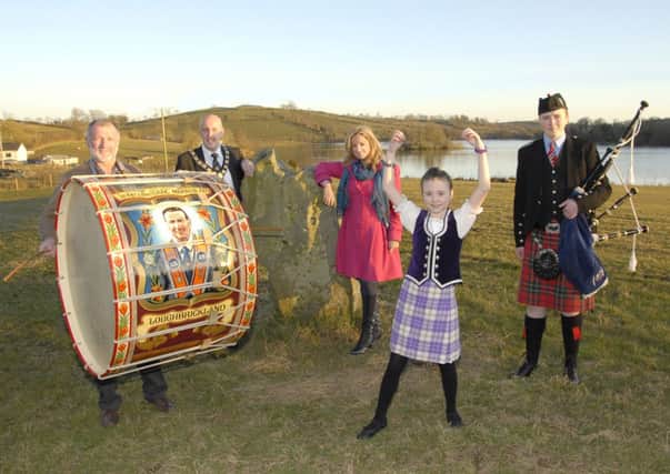 Launching the 2013 Loughbrickland and District Rural Development Association Festival, which runs until July 12 were Keith Murdoch, group chairman, Councillor Junior McCrum, who was Chairman of Banbridge District Council at the time of the photo, Jo-Anne Dobson, MLA, Rebecca Eillott, scottish dancer and James Fegan, piper with Moneygore Pipe Band, Rathfriland. Photo: Gary Gardiner.