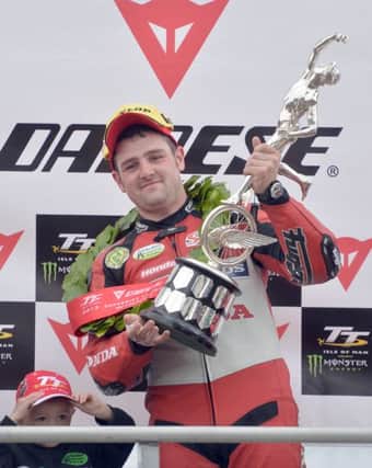 PACEMAKER, BELFAST, 2/6/2013: Michael Dunlop celebrates winning the Superbike TT on his  Honda TT Legends Fireblade today. 
PICTURE BY STEPHEN DAVISON