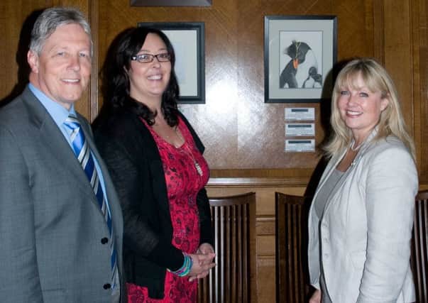 Louise Clarke with First Minister Peter Robinson and Brenda Hale, MLA.