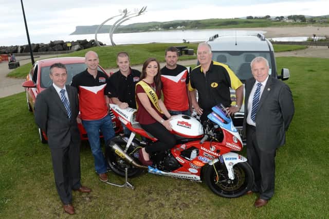 Ryan Farquhar KMR Kawasaki team set for Armoy. Ian Lamont (far left) and David Boyd (far right) of Roadside Vauxhall join KMR Kawaski Team Manager, Ryan Farquhar and road racers, Jamie Hamilton and RJ Woolsey with Clerk of the Course, Bill Kennedy and Miss Armoy Jillian Frew. Roadside Vauxhall is sponsoring the Super Twin Race and the KMR Kawaski Team powered by Northern Ireland Vauxhall Dealers will have two riders and five bikes at the event. Armoy Bike Week 2013 is from 21st- 27th July 2013.