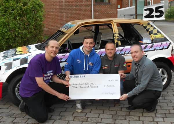 World Stock Rods Champion Chris Gordon, David McClintock and Darren Black (all from the Ballymena area) pictured presenting £5,000 raised by NI Oval Racing to Peter McCabe from NI Children's Hospice.