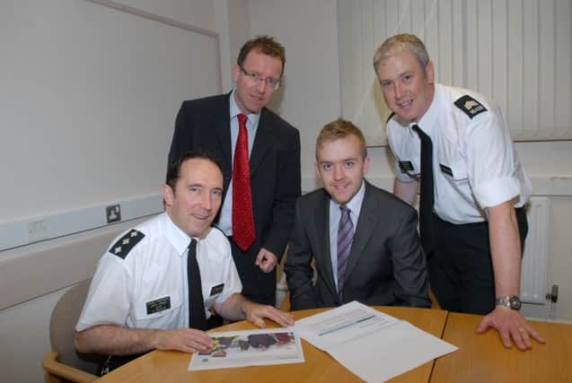 Chief Inspector John magill and Sgt Brian Stewart pictured at the launch of the Policing Plan with the Chairman of the Policing  and Community Safety Partnership Mark McKinty and the Vice Chairman Andy Wilson. INLT 28-321-PR