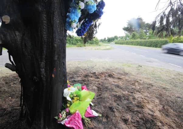 Floral tributes at the spot on the Agivey Road in Kilrea were two friends Chris O'Neill and Declan McKenna were killed on Saturday morning.PICTURE MARK JAMIESON.