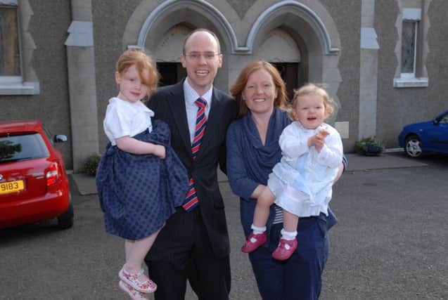 The new Minister of First Islandmagee Presbyterian Church Peter Bovill with his wife Jacqui and daughters Esther and Eliza. INLT 28-362-PR