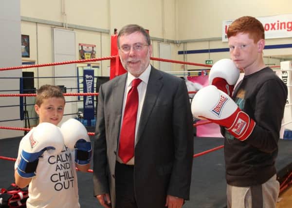 Social Development Minister Nelson McCausland pictured with Braid ABC boxers Paul O'Rawe and Corey Bradshaw, during his recent visit to the Ballykeel-based club
