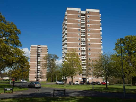 On the transfer list: Woodland House and Beechwood House flats in Rushpark. Pic by Ronnie Moore