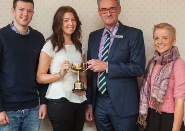 Congratulating Andreena McCurdy NRC Health & Social Care student for winning the Joy Clements Memorial Cup is Gerard Quinn, NRC Head of Faculty Care, Access and Creative Arts, also pictured is Timothy McCurdy and Jeni Campbell. INBM29-13