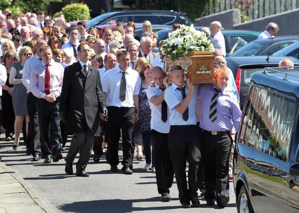 The remains of double crash victim Declan McKenna are carried from his home in Kilrea on the way to St Mary's Church, on Wednesday afternoon. Declan died alongside his friend Christopher O'Neill in a crash on the outskirts of the Co-Derry town on Saturday morning. Picture Margaret mcLaughlin © by-line 10-7-13