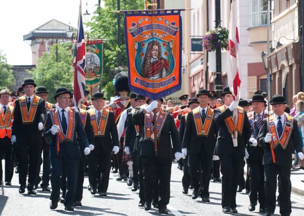 Officers of the City of Londonderry Grand Orange Lodge pictured at the head of their annual church parade on Sunday. INLS2813-154KM