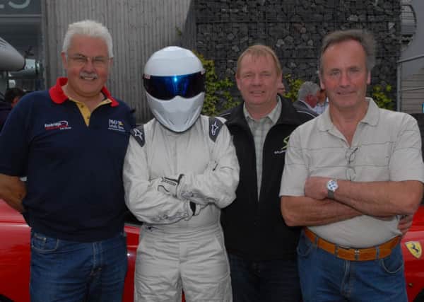 Lawrence Gibson, The Stig Denis Biggarstaff and Kenny Culbert who were among the attractions for visitors to the Banbridge Motor and Sport Car Show at The Outlet. INBL31-SHOW9