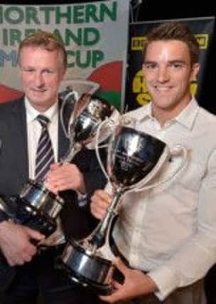 Northern Ireland manager Michael O'Neill with striker Andy Little at the 2012 Milk Cup draw.