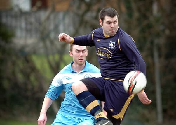 CONTROL... A Cookstown Olympic forward controls the ball during last Saturday's league encounter with Magherafelt Sky Blues Reserves at Beechway.INMM1013-338SR PICTURES: Simon Robinson