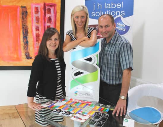 Lousie Cushnahan, Life Sciences Project Manager, Councillor Carla Lockhart, Chair of Development committee at Craigavon Borough Council and Keith McCarter, Sales and Marketing Manager of JH Label Solutions. INLM30-JH.