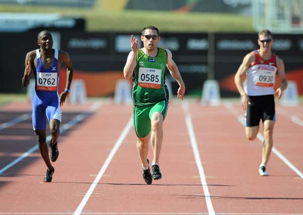 Team Irelands Jason Smyth, on his way to winning the Mens 200m  T13 final in a time of 21.05. 2013 IPC Athletics World Championships, Stadium Parilly, Lyon, France.