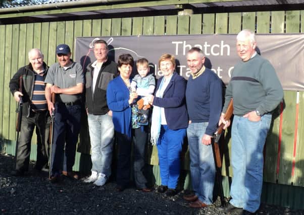 Cathy McKillop of Shine NI receiving a cheque from Adrain & Fiona Marshall from the proceeds of The Richard Marshall Memorial, Clay Target Shoot. Included in the picture are Club Members and Club leader, Raymond Clyde. Total raised was £3052.00.