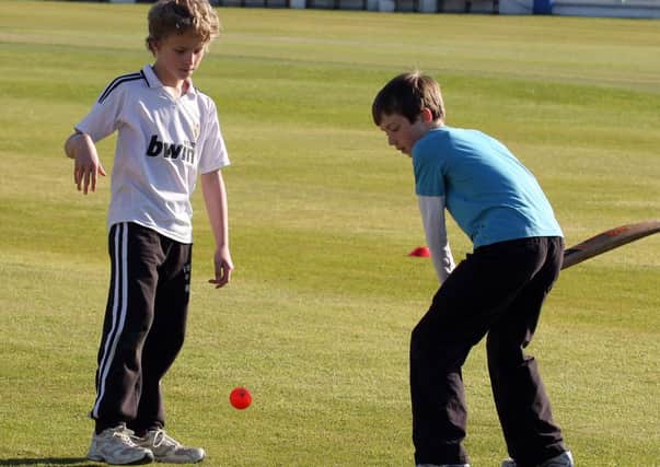 Jay Johnston and Tommy Orr, taking part in the Eglinton Cricket Clubs during a recent weekly junior coaching evening.  INLS 1323-506MT. The pitch, which is regularly used by the community and is a brilliant facility for local young people, has been extensively damaged in an overnight attack.