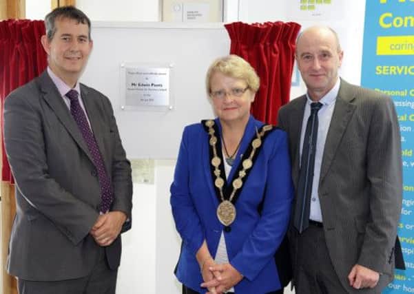 Pictured at the opening of the new Advanced Community Care office at Ballinderry Business Park are Health Minister Edwin Poots, who carried out the official opening, with Lisburn Mayor Margaret Tolerton and Nial Smith, director at Advanced Community Care. US1327-539cd