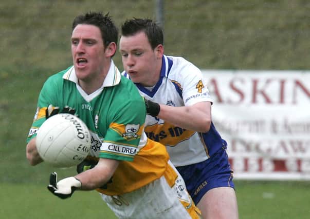 Martin Grimes, Kildress in action for his club against Cathal McCrory, Errigal Ciaran