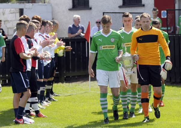 Bobby Larmour Memorial Cup Final: Banbridge Town v Cliftonville - Banbridge Town players formed a guard of honour as Cliftonville took the field in this the eighth year of the Bobby Larmour Memorial Trophy Final, Banbridge went on to win the trophy for the first time beating Cliftonville 3 - 2 © Edward Byrne Photography INBL31-255EB