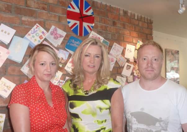 Jo-Ann Dobson with Lana and Karl Wells.