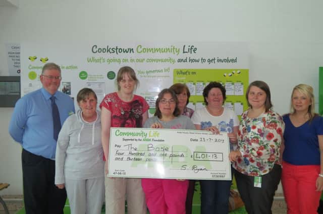 Members from the Northern Trusts Base "Drop-in" Centre in Cookstown, who recently took part in a Bag Pack to fundraise for the facility as part of Asdas Community Life Project.