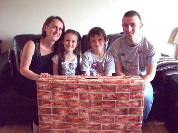 Sarah, Amie, Zach and John Neill raised £711 for the NI Hospice Buy A Brick campaign. INNT 32-500CON