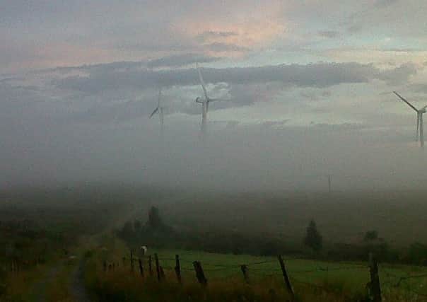 The wind turbines at Curryfree hidden in the mist that descended last week.