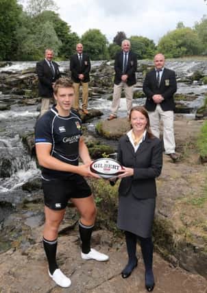 Galgorm Resort & Spa Sales & Marketing manager Beth Swindlehurst presents sponsorship to Ballymena RFC 1st XV player Matthew Rae while looking on are  managers Peter McKenzie (left) and Glenn Boyd (right), Business & Development Manager Derek Montgomery (2nd left) and vice-chairman Tom Wiggins at last week's launch of the new sponsorship deal between Galgorm Resort & Spa and Ballymena RFC.