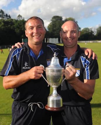 Cricket - Waringstown v Coleraine - Ulster Cup Final - Presseye - Sunday 4th August 2013
Copyright Presseye / Declan Roughan
Coleraine win the Ulster Cup - Captain david Cooke (right) celebrates winning the cup with his brother Gordon