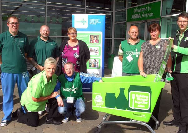 Photographed at the ASDA store in Antrim were staff members Roisin, Pat, Eunice and Nicholas with Ballymena Food Bank helpers Ricky, Willia, Darren and Trevor where information and a collection was taken on Saturday. INBT 32-905H
