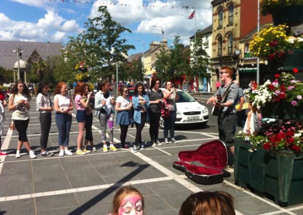 Musician Conor Scott from BBCs The Voice entertaining the crowds in Lurgan last week.