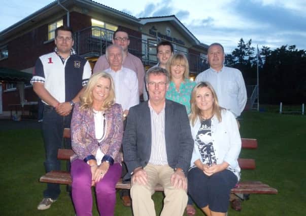 Ulster Unionists attending the Pig on a Spit event at Waringstown Cricket Club - Back Row, from left, Marc Woods - secretary, Eddie Nimmons - chairman, Aaron Carson, Neil Harrison, Caroline Kerr, treasurer and Stephen Harrison.  Front, Jo-Anne Dobson MLA, party leader Mike Nesbitt MLA and Lynda Bryans.