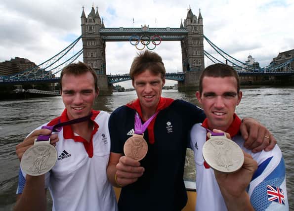 Presseye Northern Ireland - 07th August 2012 Mandatory Credit - Photo-William Cherry/Presseye

London 2012 Olympic Games - Medals

Northern Ireland's Olympic rowers Richard Chambers, Alan Campbell and Peter Chambers pictured on the Thames river at Tower Bridge with the medals they won in the London 2012 Olympic Games rowing.