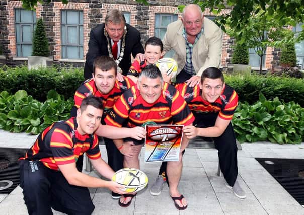 Ophir RFC players Daniel McNeill, Paddy McCabe, Gavin Robinson and Brian Harper launch the Sevens tournament with the help of Mayor Fraser Agnew, Daniel Robinson (6) and club president, Martin Morrison.